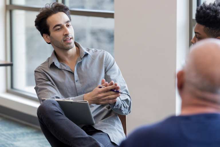Counselor talking to group