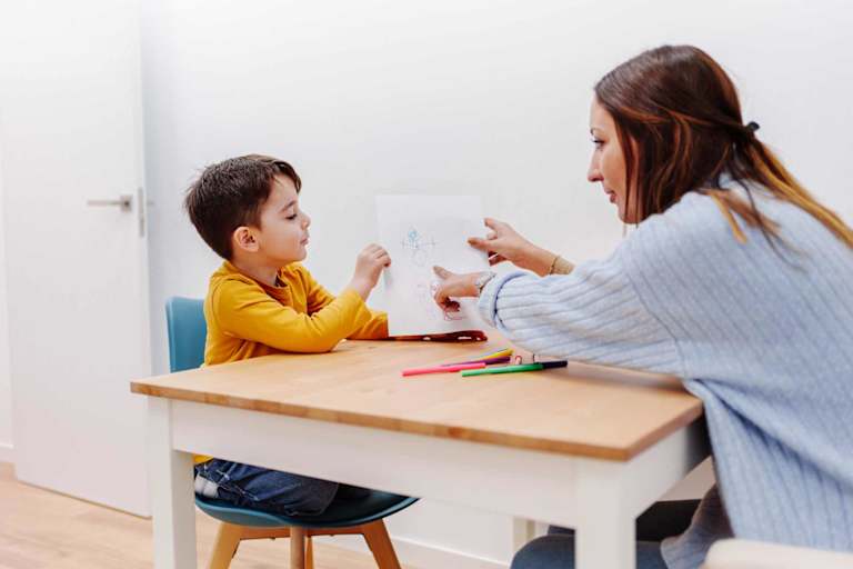 School psychologist working with young student